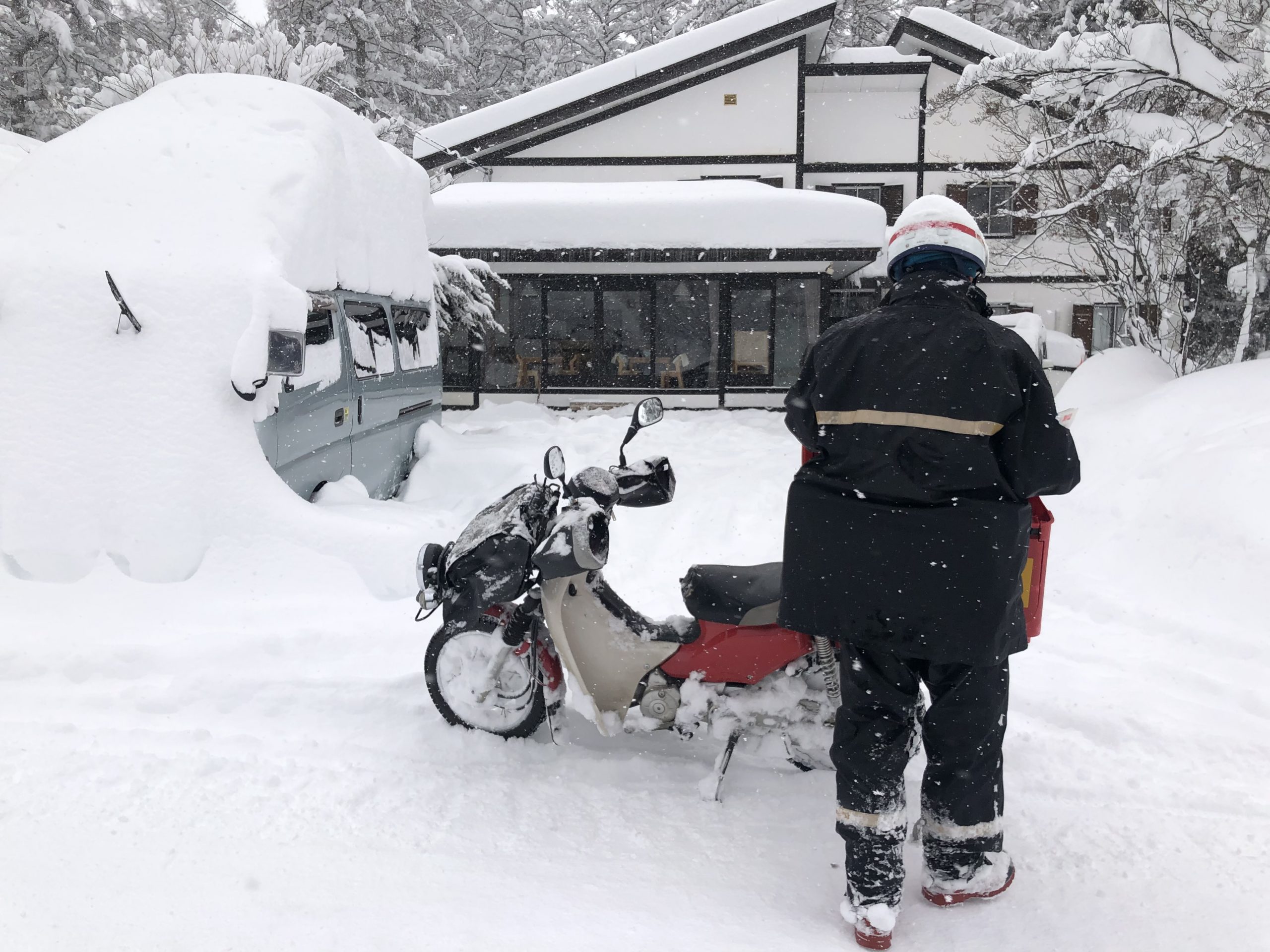 Japan Post Delivering Mail in a Blizzard